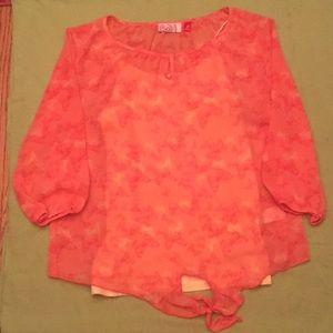 Orange butterfly shirt with yellow cami underneath